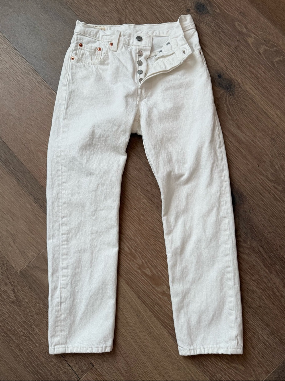 Levi’s women’s cropped White Button-Fly Jeans